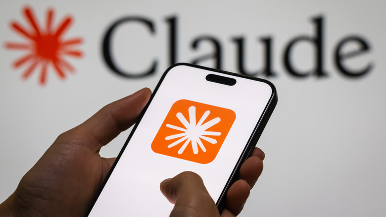 A Claude logo on a smartphone.
