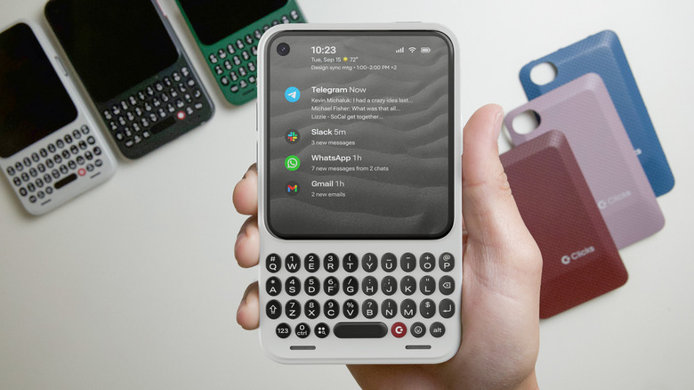The BlackBerry-like Clicks Communicator smartphone in hand